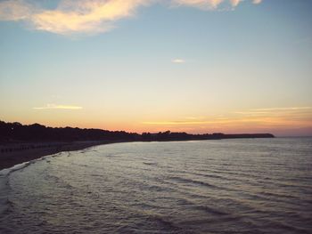 Scenic view of sea at sunset