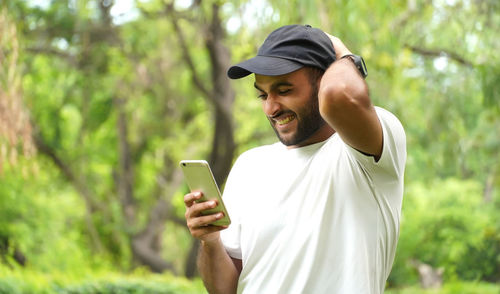 Young man using mobile phone