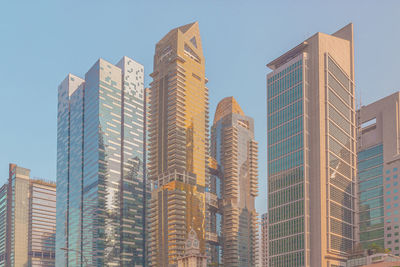 Modern buildings against clear sky in city