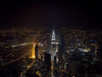 Illuminated cityscape at night