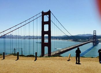 Suspension bridge against sky