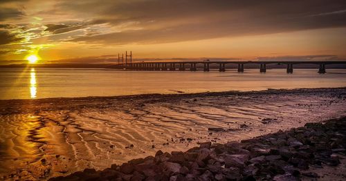 View of beach at sunset