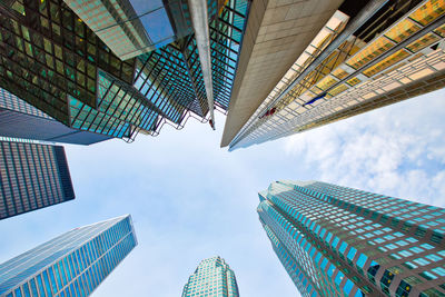 Low angle view of modern buildings against sky