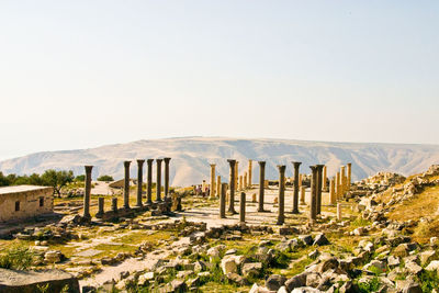 View of ruins of landscape against clear sky