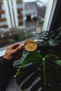 Man holding coffee cup