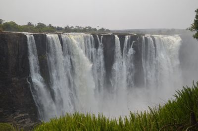 View of waterfall against clear sky