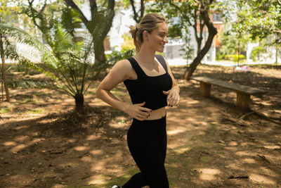 Woman running and jogging at a park outdoors. athlete female person during workout. healthy 