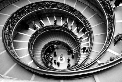 High angle view of people on spiral staircase in vatican museum