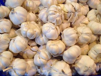 Full frame of garlics at market