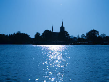 View of river with buildings in background