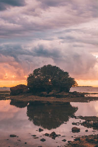 Scenic view of sea against sky during sunset