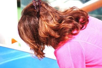 Rear view of woman with pink hair