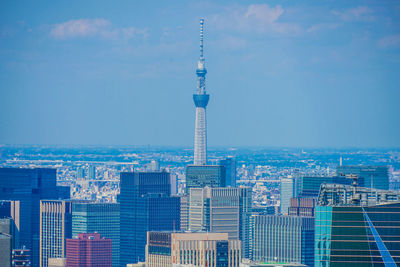 Modern buildings in city against sky