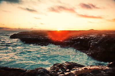 Scenic view of sea against sky during sunset