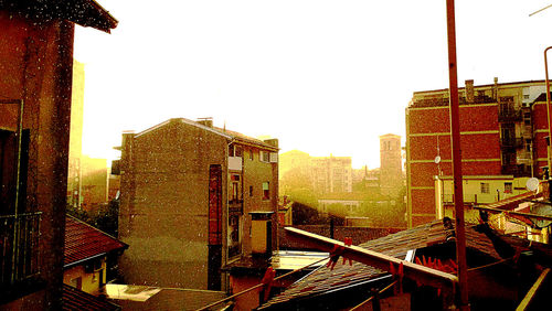 Buildings against clear sky