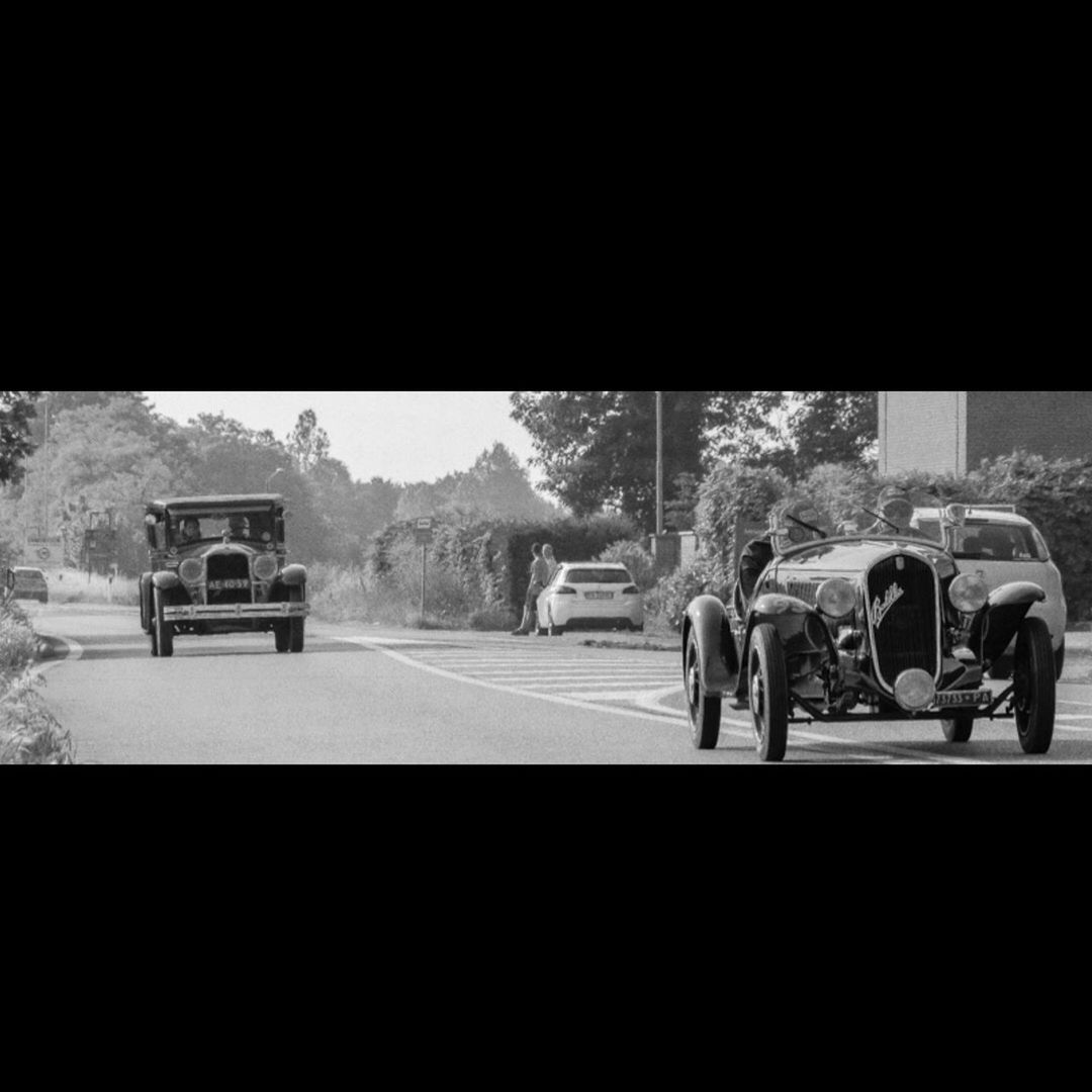 group of people, transportation, real people, car, men, motor vehicle, architecture, mode of transportation, day, city, land vehicle, full length, people, women, nature, road, adult, copy space, rear view, street, waiting