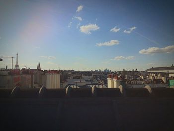 View of buildings against cloudy sky