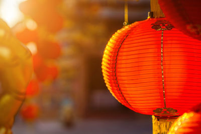 Close-up of illuminated lantern against blurred background