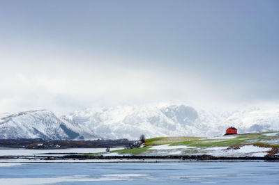 Scenic view of snowcapped mountains against sky norway