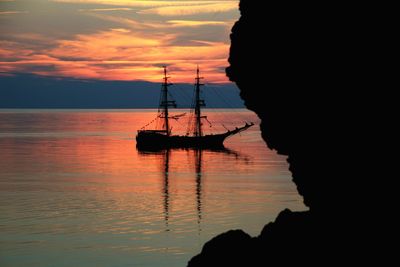 Silhouette of boats in sea