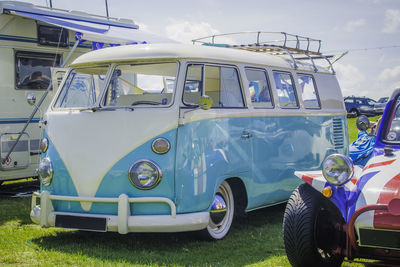 Blue campervan against blue sky