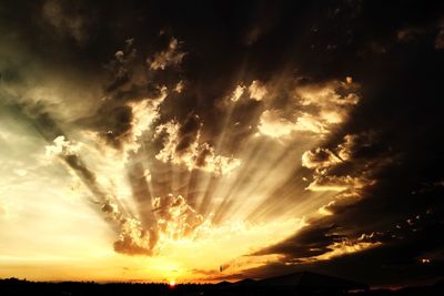 Scenic view of dramatic sky during sunset