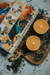 High angle view of orange fruits on table