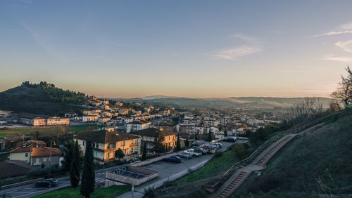 High angle view of townscape against sky at sunset