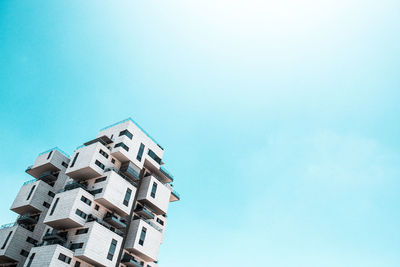 Low angle view of buildings against clear sky