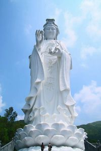 Low angle view of statue against sky