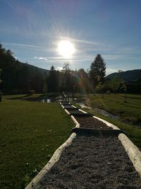 Scenic view of farm against sky