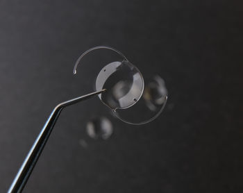 High angle view of electric lamp against black background