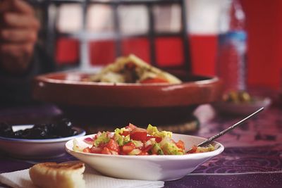 Close-up of salad in bowl on table