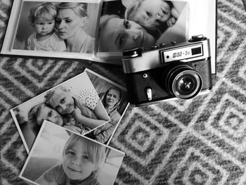 Close-up of camera and instant print transfers