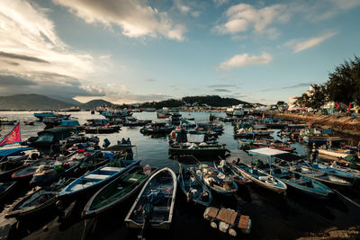 Boats moored at harbor