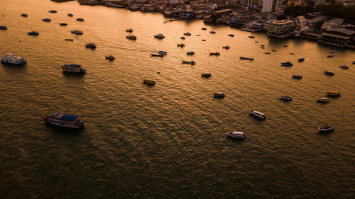 High angle view of beach against sky during sunset