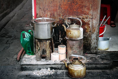 Kitchen utensils and kettles at street tea stall