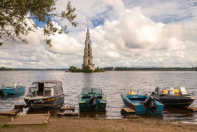 Boats moored at dock