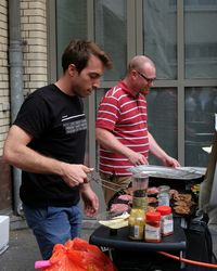 Men standing in front of man