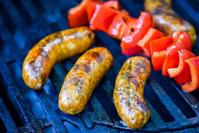 High angle view of meat on barbecue