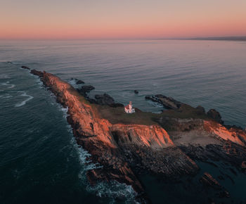 Cape arago lighthouse at the oregon coast at sunset. pacific coast scenic landscape.