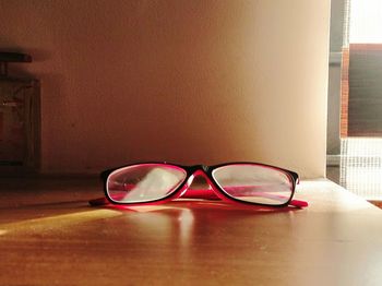 Close-up of sunglasses on table