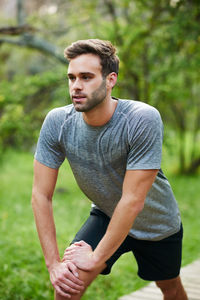 Portrait of young man exercising outdoors