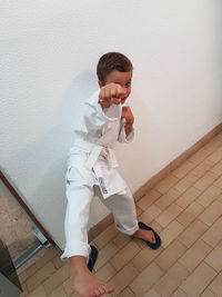 Boy standing at home