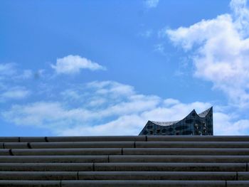 Low angle view of steps against sky