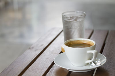 Close-up of coffee cup on table