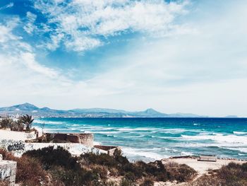 Scenic view of sea against cloudy sky