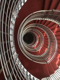 Directly below shot of spiral staircase in building