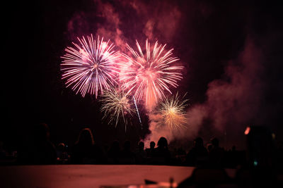 Firework display at night