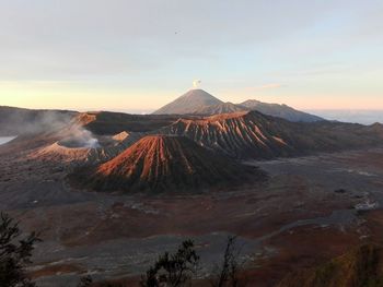 Scenic view of mountains against sky during sunset